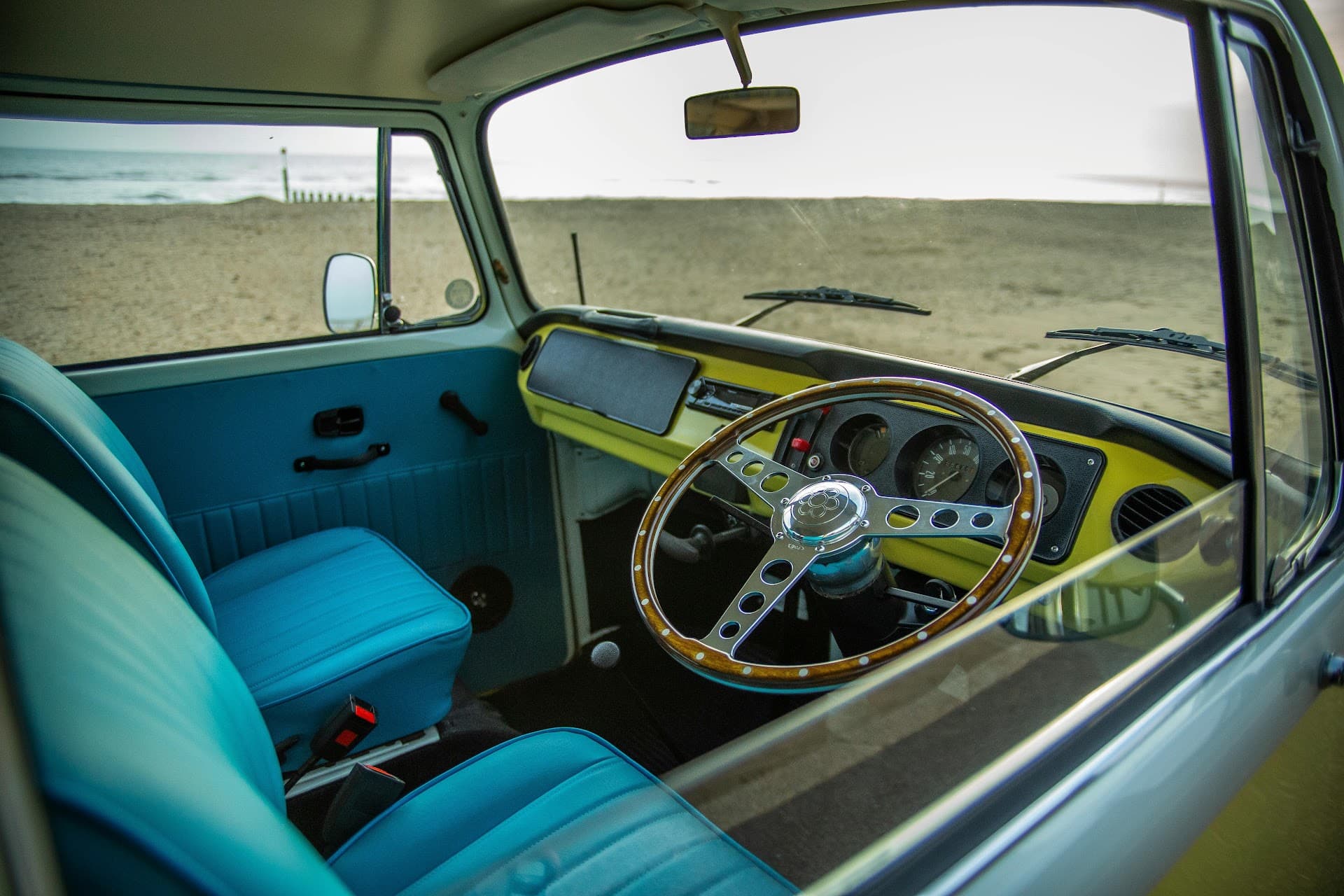 Campervan seats upholstered in turquoise by Crown Upholstery